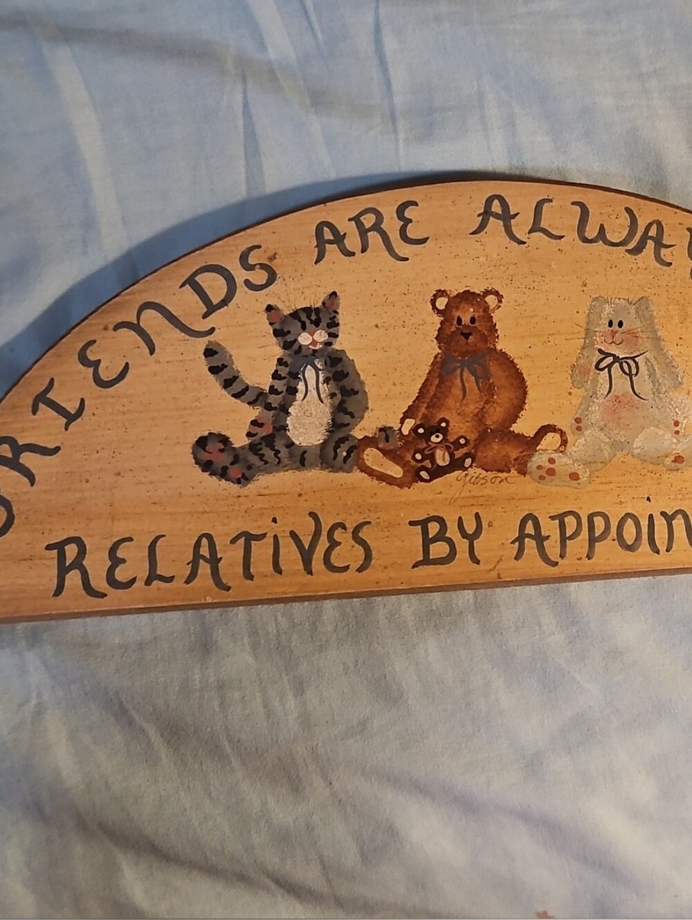 Wooden Half-Moon Wall Sign with Painted Animals: Friends always welcome